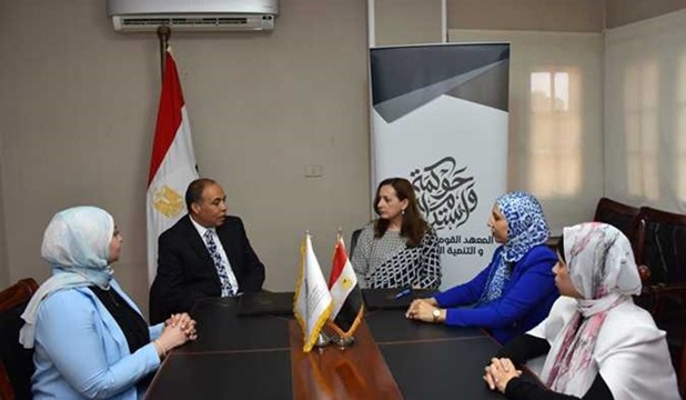 Representatives from NIGSD and AFYS signing their cooperation agreement.